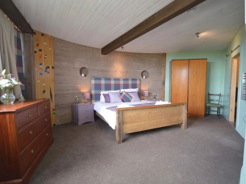 The Loch Leven Earth Ship, Perth and Kinross - pet friendly, quirky holiday lodge, in Scotland with hot tub and wood burning stove on a working farm