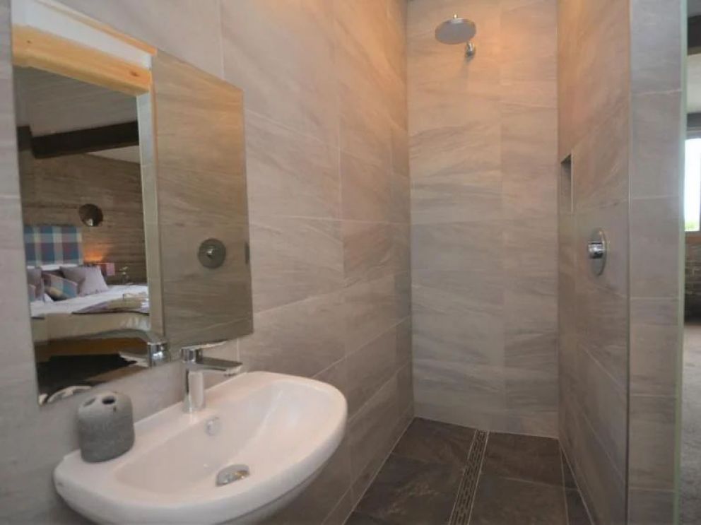 The Loch Leven Earth Ship, Perth and Kinross - pet friendly, quirky holiday lodge, in Scotland with hot tub and wood burning stove on a working farm