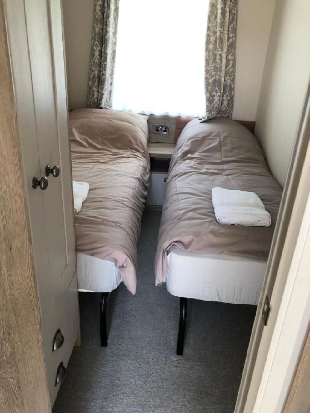 Culver View Lodge at Whitecliff Bay Holiday Park, Bembridge, Isle of Wight - holiday home for rent with decking and garden, close to the beach