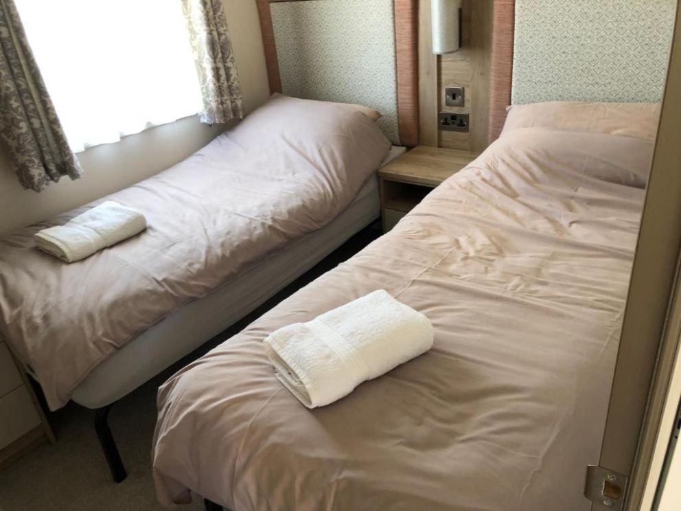 Culver View Lodge at Whitecliff Bay Holiday Park, Bembridge, Isle of Wight - holiday home for rent with decking and garden, close to the beach