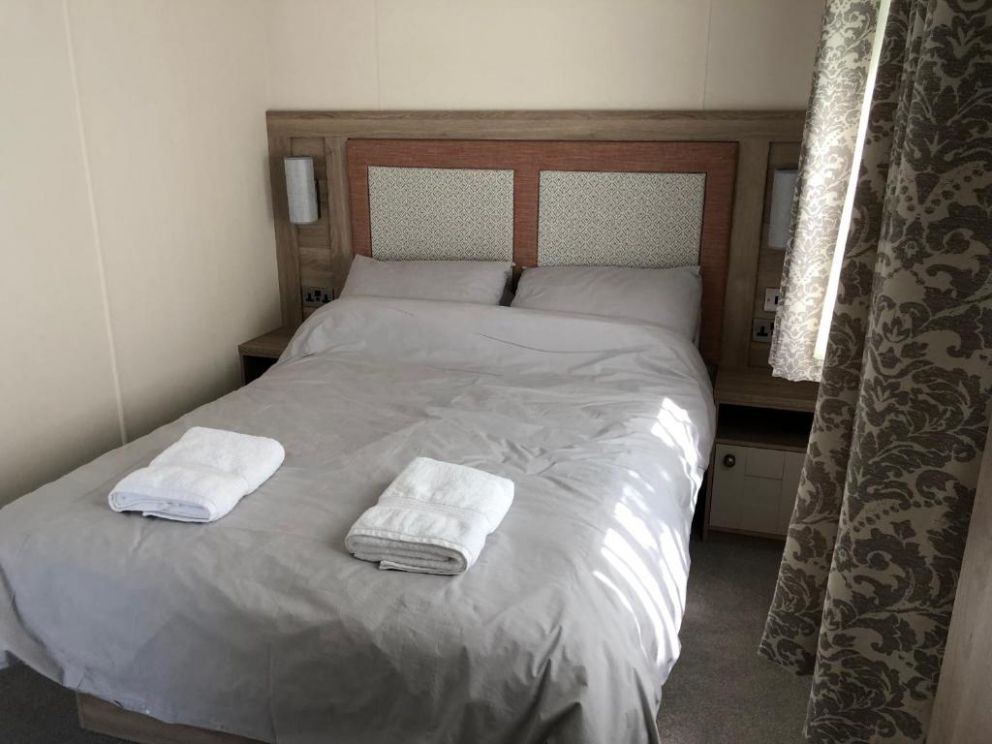 Culver View Lodge at Whitecliff Bay Holiday Park, Bembridge, Isle of Wight - holiday home for rent with decking and garden, close to the beach