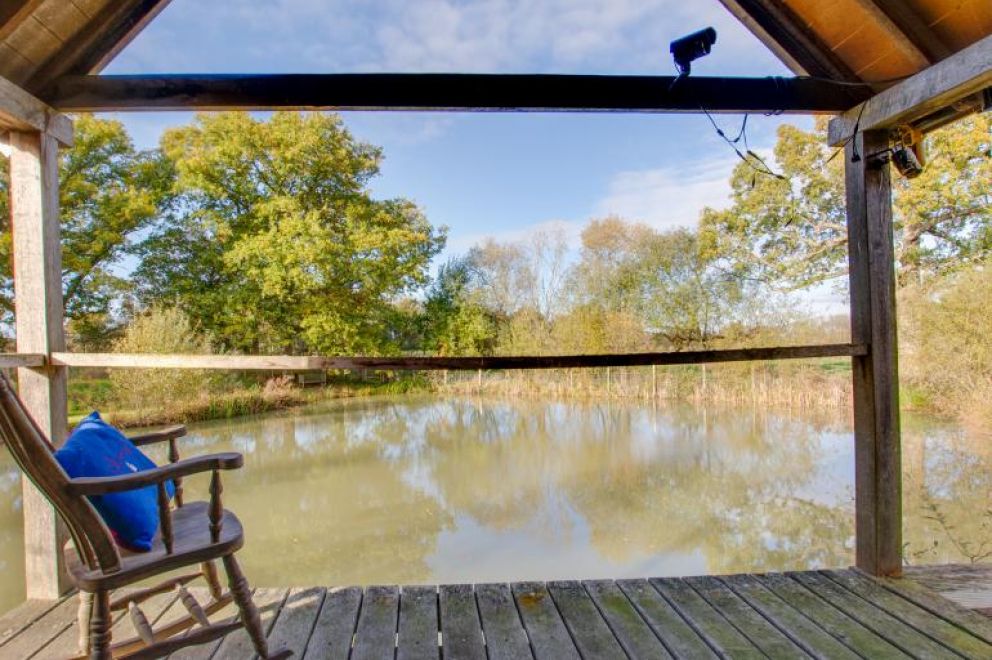 Plush Huts, Biddenden, East Sussex - pet friendly, lakeside holiday lodge, with enclosed garden, hot tub and wildlife cameras