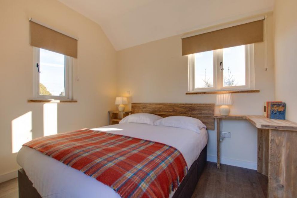 Plush Huts, Biddenden, East Sussex - pet friendly, lakeside holiday lodge, with enclosed garden, hot tub and wildlife cameras