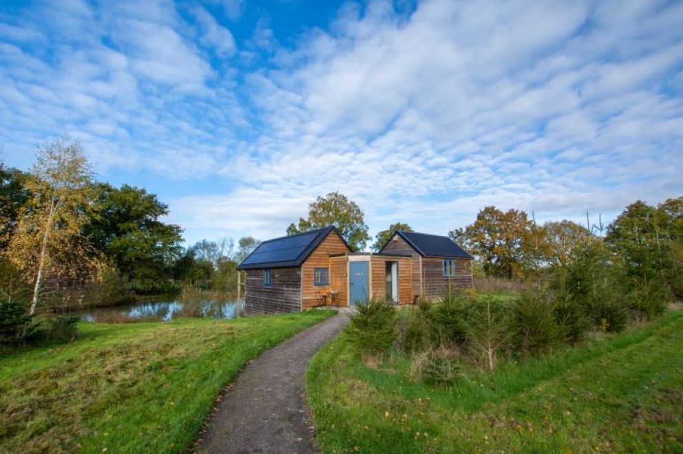 Plush Huts, Biddenden, East Sussex - pet friendly, lakeside holiday lodge, with enclosed garden, hot tub and wildlife cameras