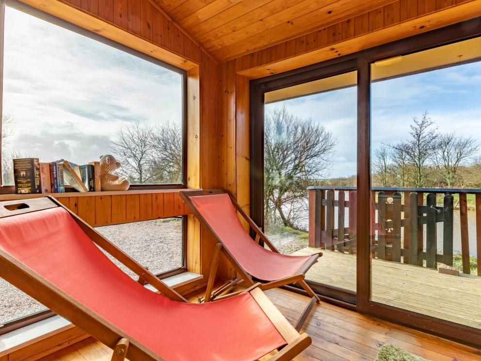 Cabins at Clovelly Lakes - lakeside lodges for rent. Relax and admire the lake views