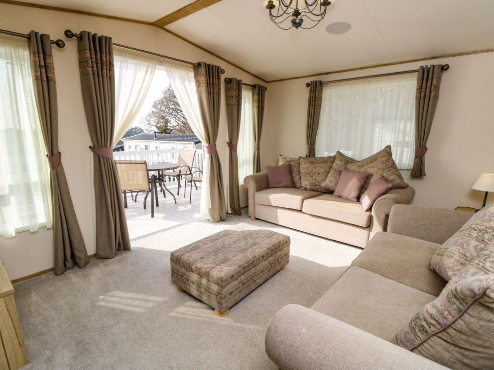 Crosswinds 68 on Whitecliffe Bay Holiday Park in Bembridge for rent - park has swimming pools, club house, entertainment and more with access to the beach