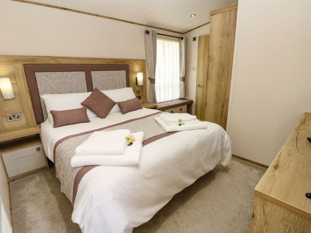 Crosswinds 68 on Whitecliffe Bay Holiday Park in Bembridge for rent - park has swimming pools, club house, entertainment and more with access to the beach