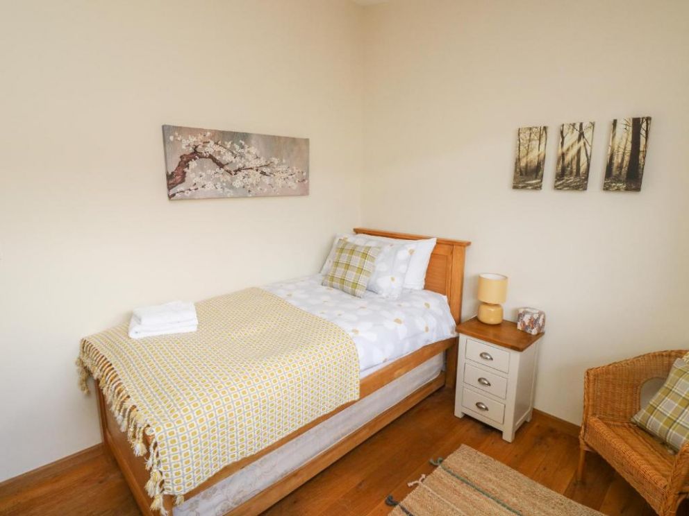 Gloccamaura, Newton Abbot, Devon - pet friendly holiday lodge, with hot tub, wood burning stove and enclosed garden