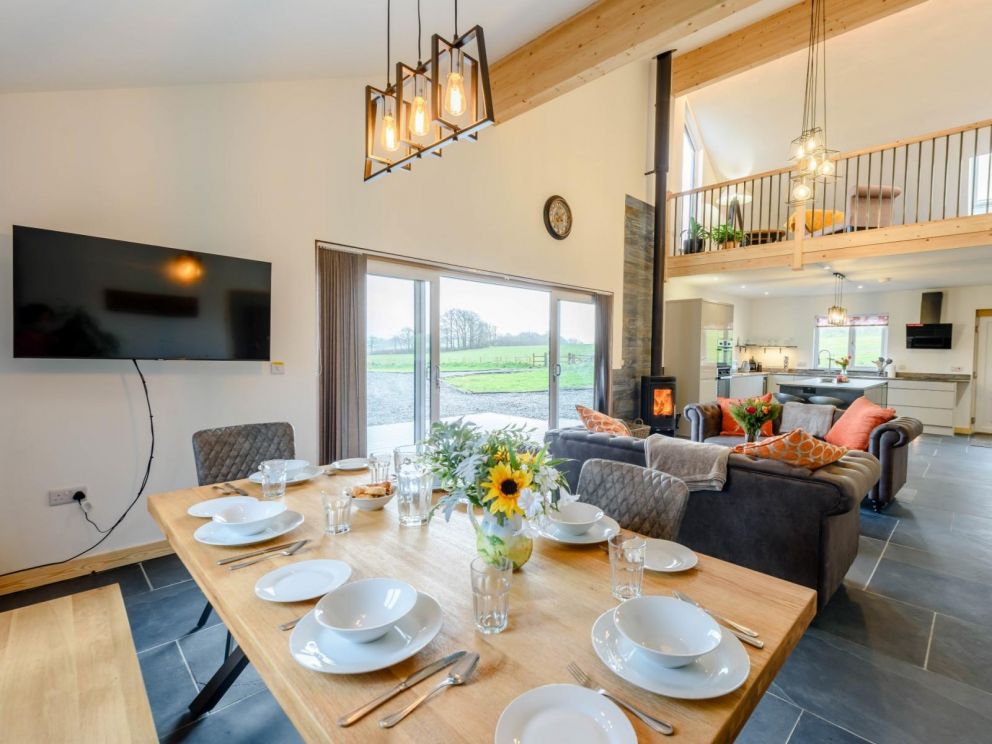 Luxury Lake Retreat with private lake in Devon - for rent with carp fishing, paddle boarding, hot tub and wood burner