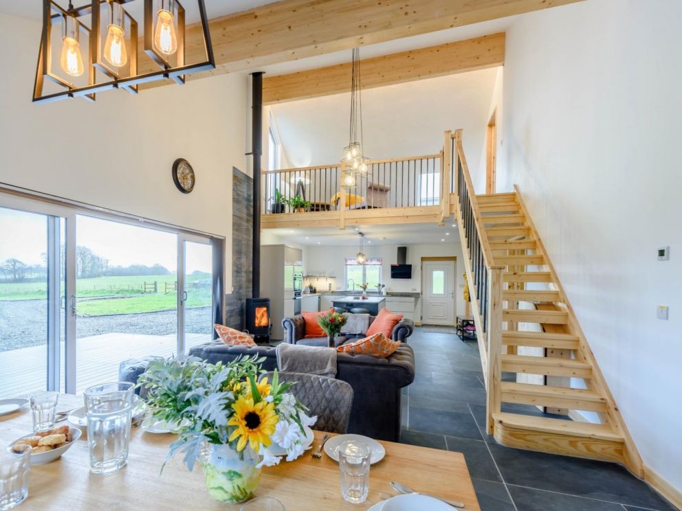 Luxury Lake Retreat with private lake in Devon - for rent with carp fishing, paddle boarding, hot tub and wood burner