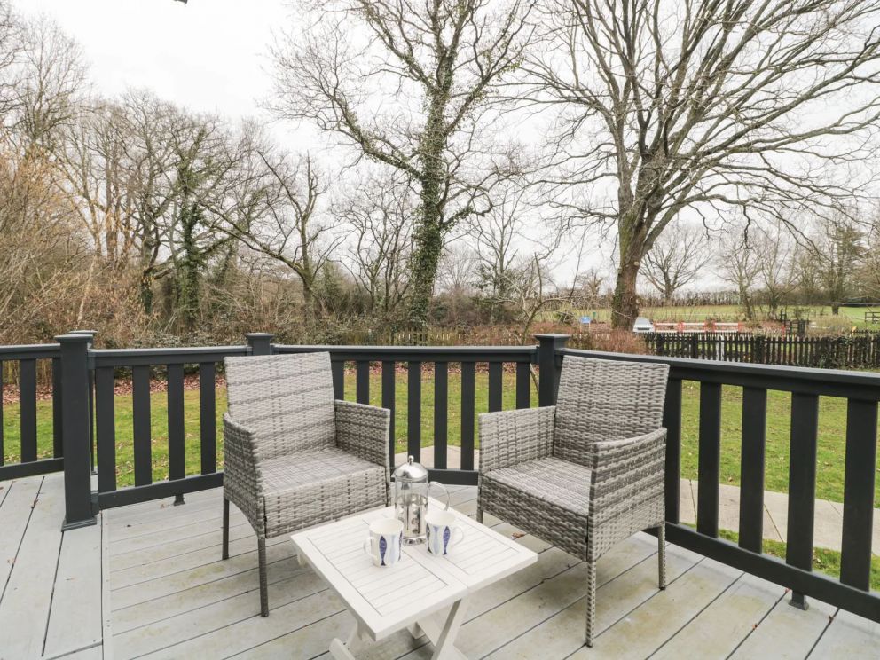 Owls Nest, Furzehill, Dorset - pet friendly, lodge on holiday park with outdoor pool, children's pool, volleyball, basketball & tennis courts, adventure playground, table tennis and dog paddock