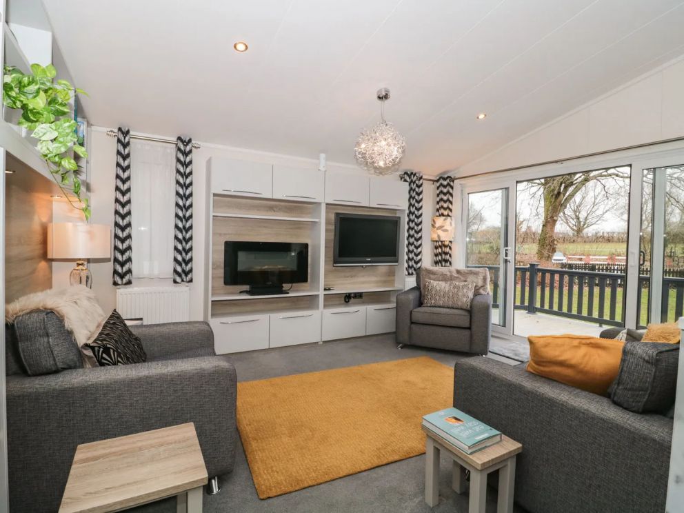 Owls Nest, Furzehill, Dorset - pet friendly, lodge on holiday park with outdoor pool, children's pool, volleyball, basketball & tennis courts, adventure playground, table tennis and dog paddock