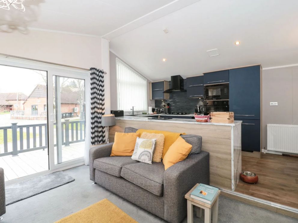 Owls Nest, Furzehill, Dorset - pet friendly, lodge on holiday park with outdoor pool, children's pool, volleyball, basketball & tennis courts, adventure playground, table tennis and dog paddock