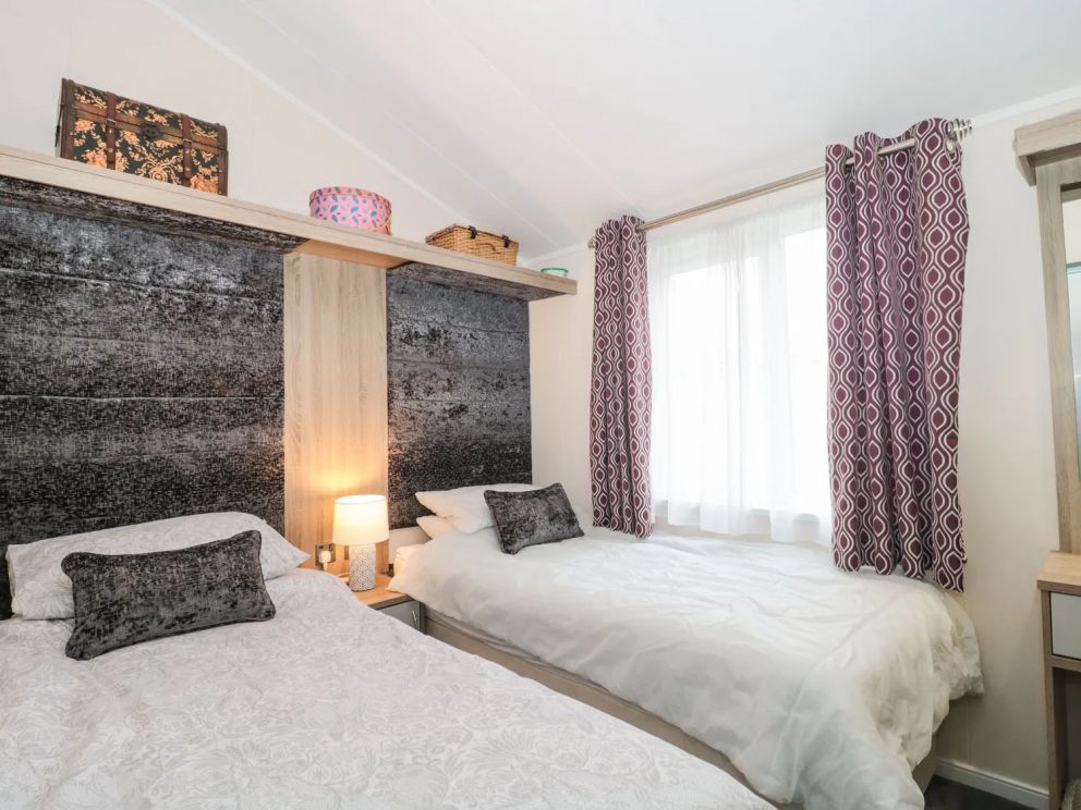 Owls Nest, Furzehill, Dorset - pet friendly, lodge on holiday park with outdoor pool, children's pool, volleyball, basketball & tennis courts, adventure playground, table tennis and dog paddock