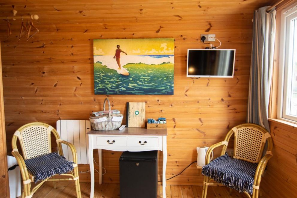 Tolcarne Beach Cabins - on the beach in Newquay, Cornwall. Private beach and restaurant on site