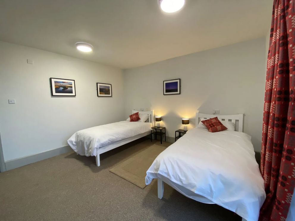 The Lodge in Staylittle in Powys - sleeps 40 guests, pet friendly, with activity room, table tennis, table football, fire pit and wood burning stove