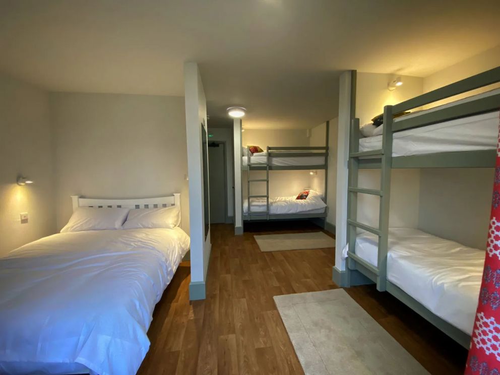 The Lodge in Staylittle in Powys - sleeps 40 guests, pet friendly, with activity room, table tennis, table football, fire pit and wood burning stove