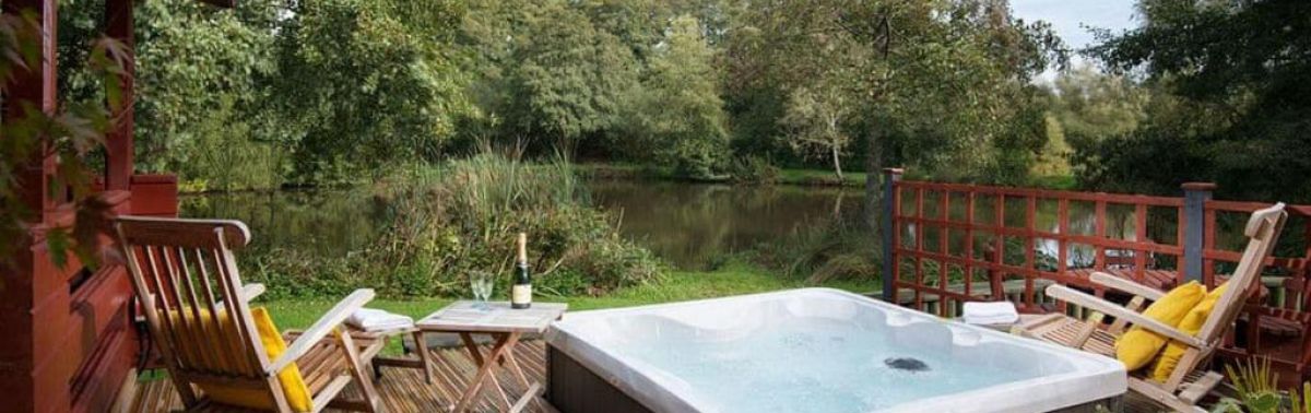 Otterfalls hot tub lodges in Devon with fishing